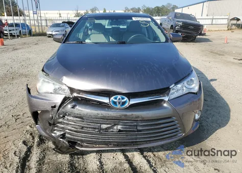 2016 Toyota Camry Hybrid z USA, uszkodzony, nr VIN 4T1BD1FK5GU179176